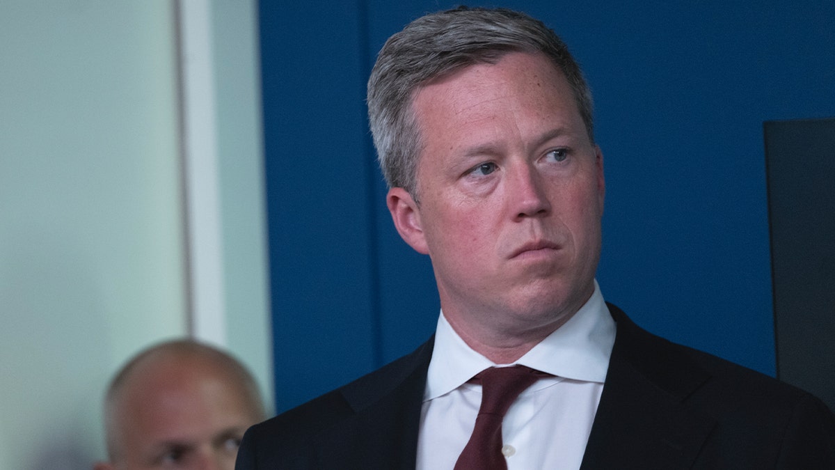 Army Secretary Dan Driscoll, listens to President Donald Trump speak to reporters, in the James Brady Press Briefing Room at the White House