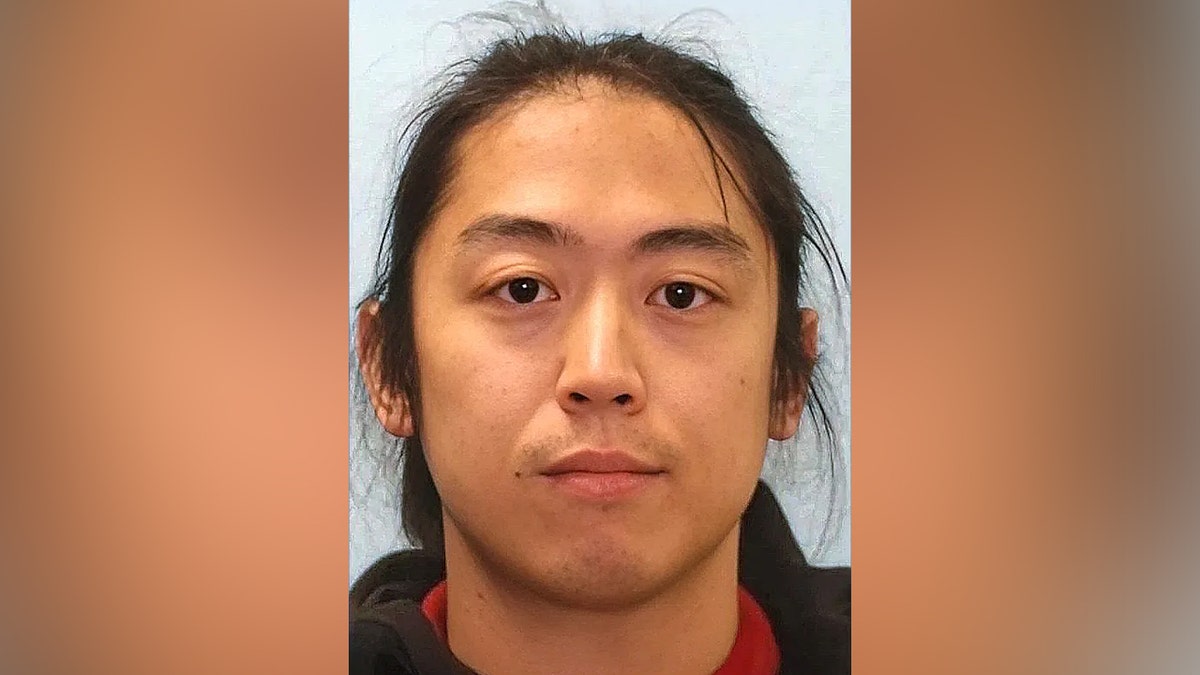 Benjamin Song, alleged Texas ICE attacker, poses for a mugshot