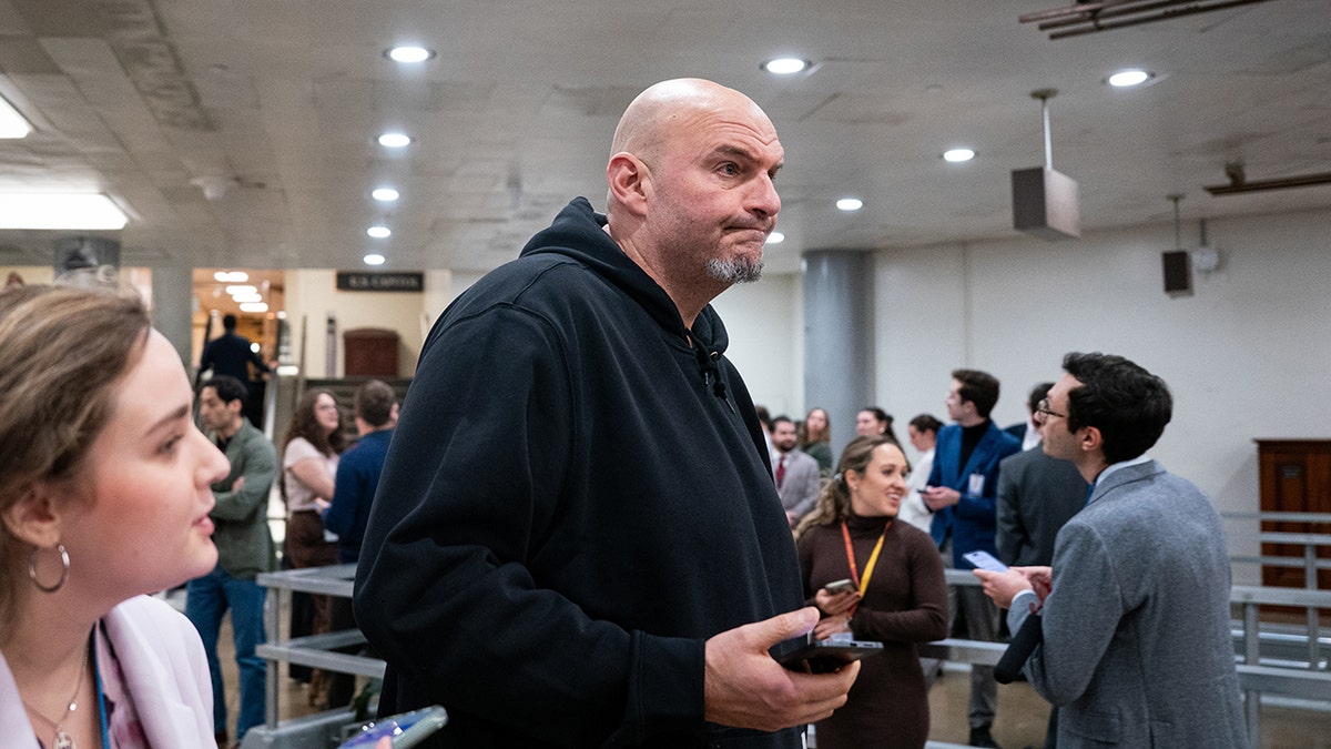 Sen. John Fetterman leaves the U.S. Capitol following a vote