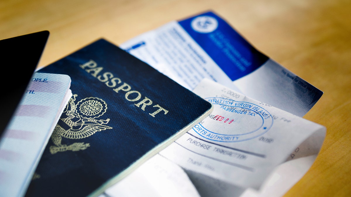 passports with papers on table