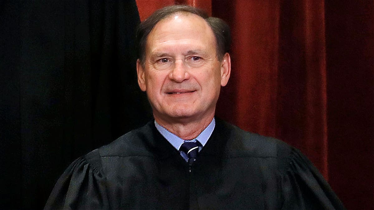 Supreme Court Associate Justice Samuel Alito standing in Washington D.C.