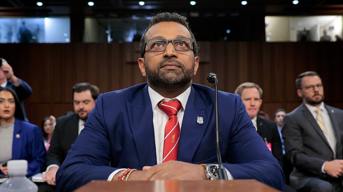 FBI Director Kash Patel walking into Senate Judiciary Committee hearing room