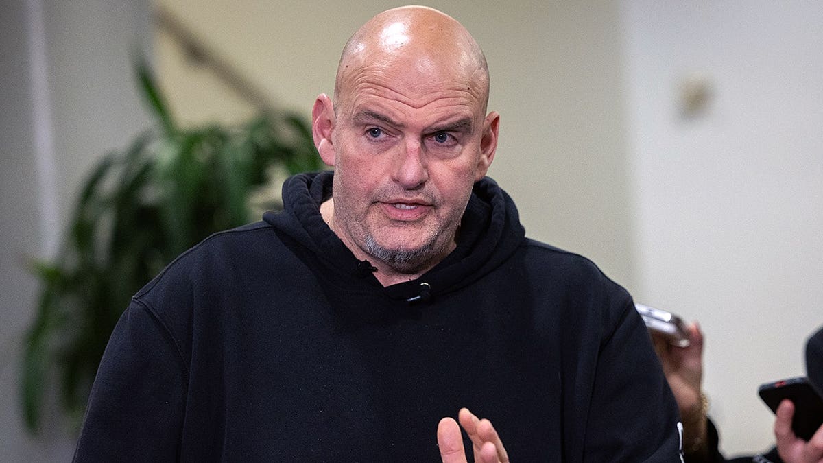 Sen. John Fetterman speaking to reporters