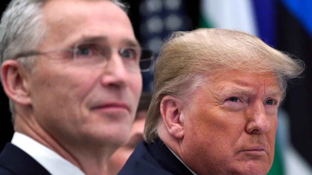 U.S. President Donald Trump and NATO Secretary General Jens Stoltenberg seated at a table during a working lunch