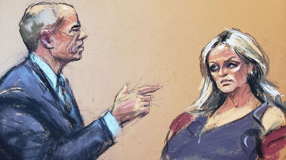 Former attorney Michael Avenatti cross-examining witness Stormy Daniels in a courtroom