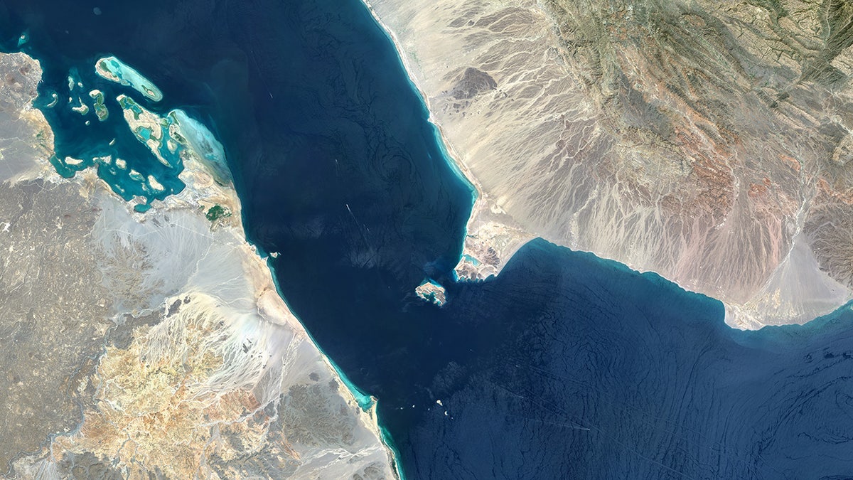 Aerial view of the Bab el-Mandeb Strait showing waterway and surrounding land.