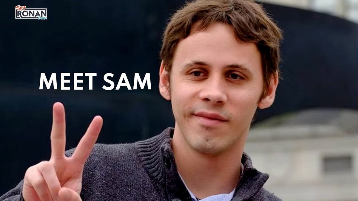 Sam Ronan pictured holding up a peace sign.