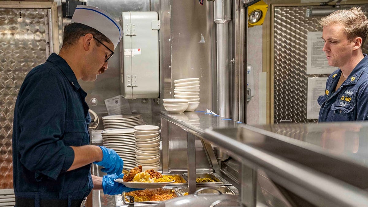 US sailors receive meals at sea