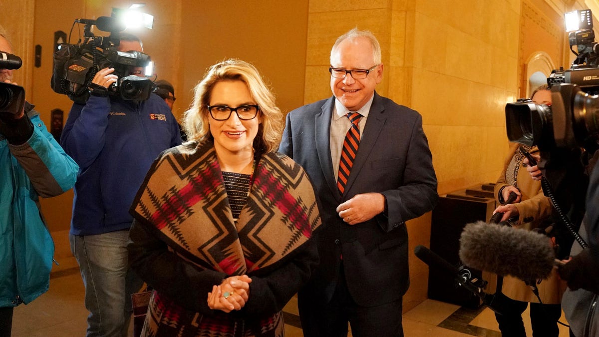 Minnesota Lt. Gov.-elect Peggy Flanagan and Gov.-elect Tim Walz arriving at State Capitol in St. Paul