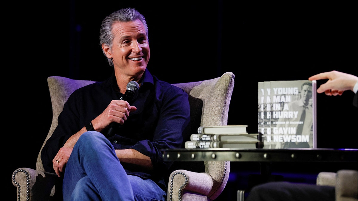 California Gov. Gavin Newsom speaking at a book tour event in Portsmouth, New Hampshire
