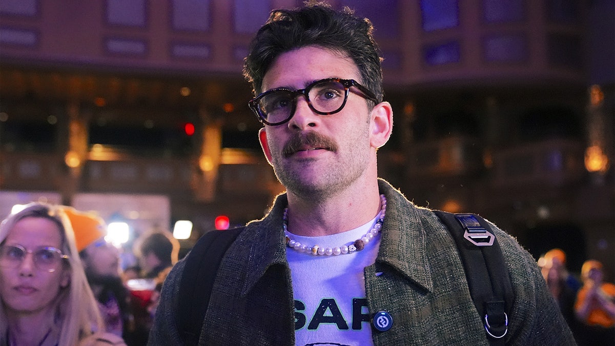 Zohran Mamdani speaking to supporters at election watch party in New York City with Hasan Piker present