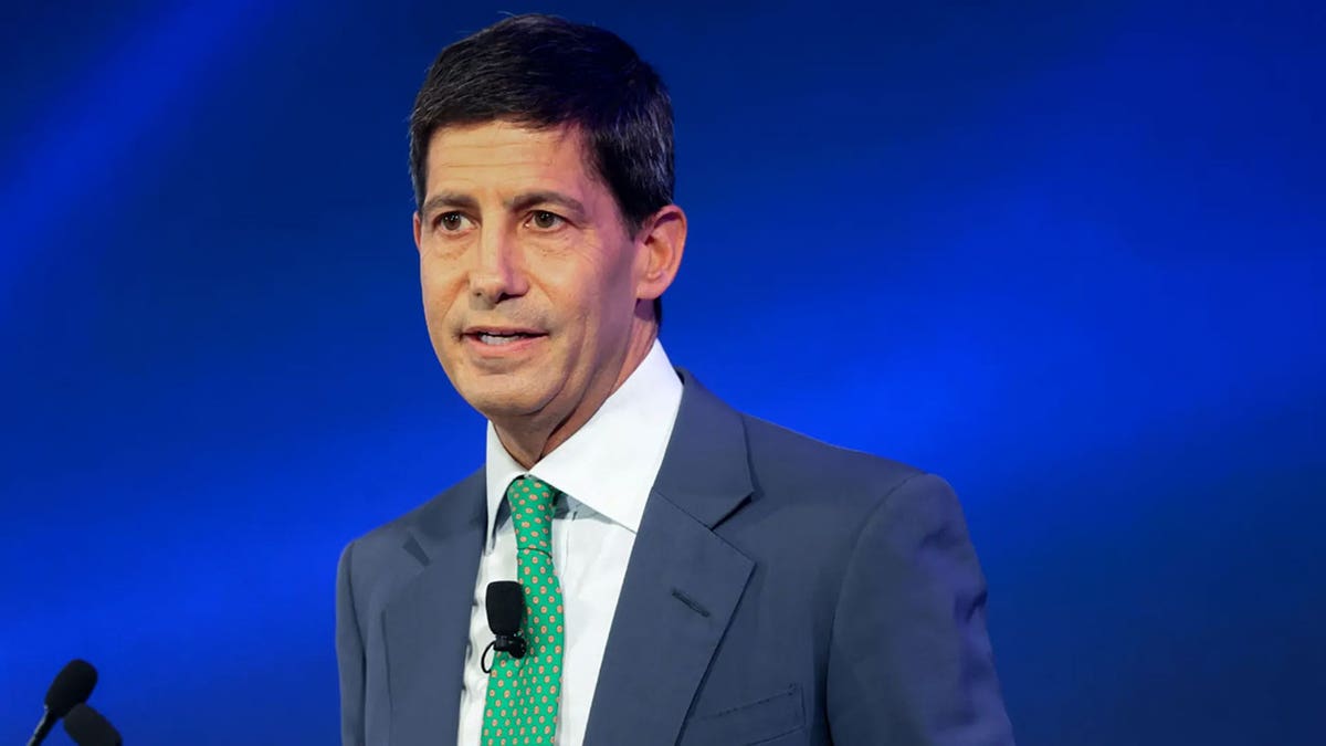 Kevin Warsh speaking at IMF headquarters in Washington, D.C.
