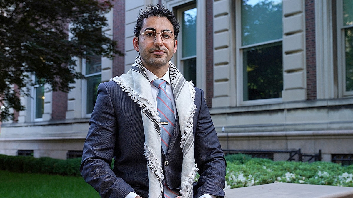 Mohsen Mahdawi standing and speaking at Columbia University protest