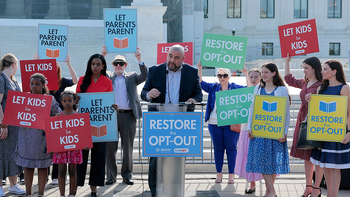 Parents from Montgomery County Public Schools outside Washington, D.C., protest outside the United States Supreme Court.