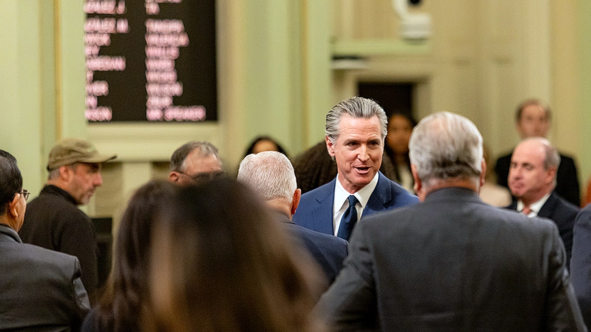 California Gov. Gavin Newsom departing California State Capitol Assembly Floor