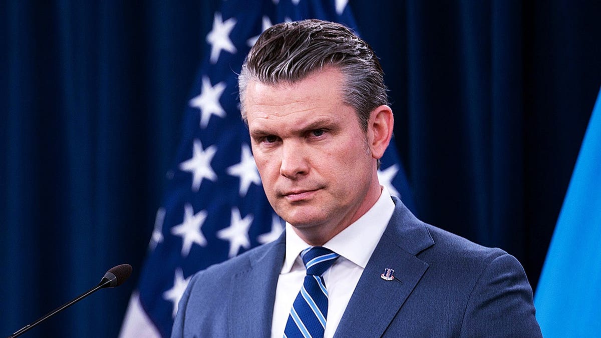 Defense Secretary Pete Hegseth answering questions during a press briefing at the Pentagon