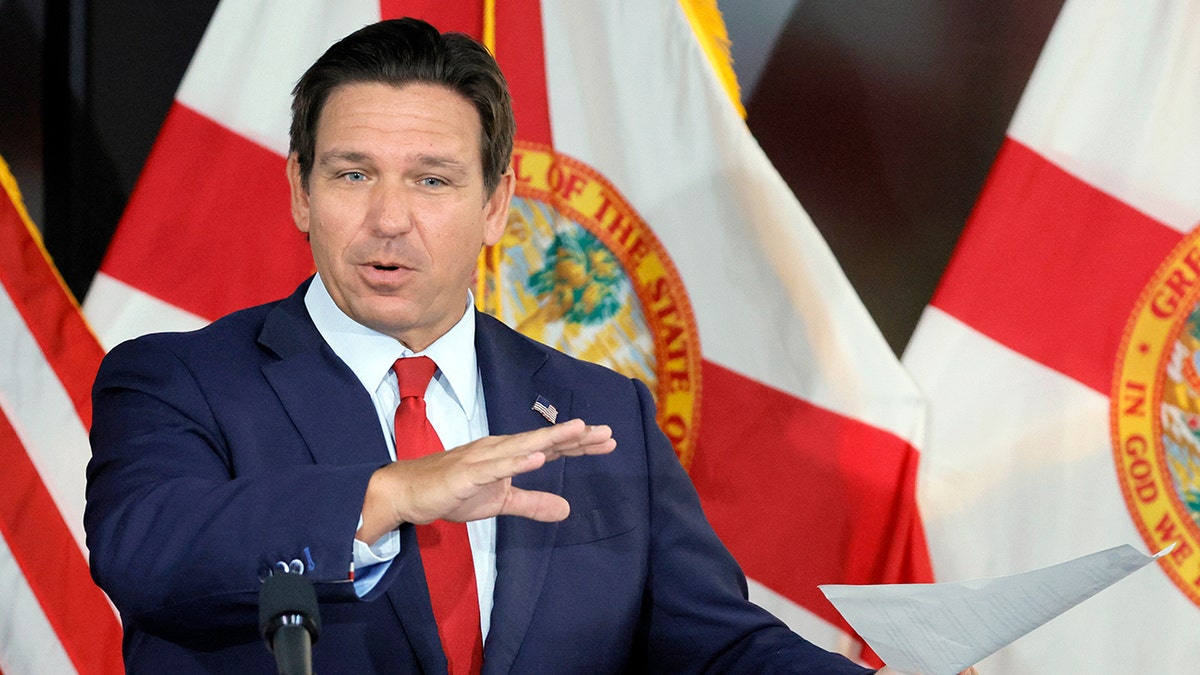 Florida Gov. Ron DeSantis speaking at a news conference in Fort Lauderdale