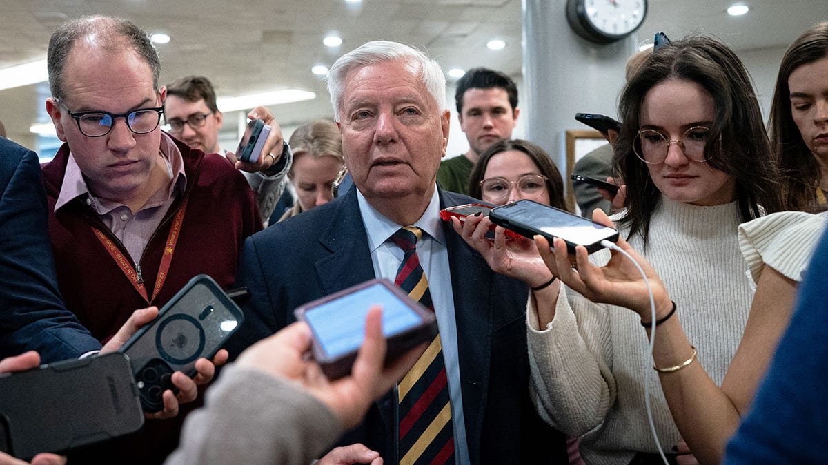 Sen. Lindsey Graham speaking to media in the Senate Subway at the US Capitol