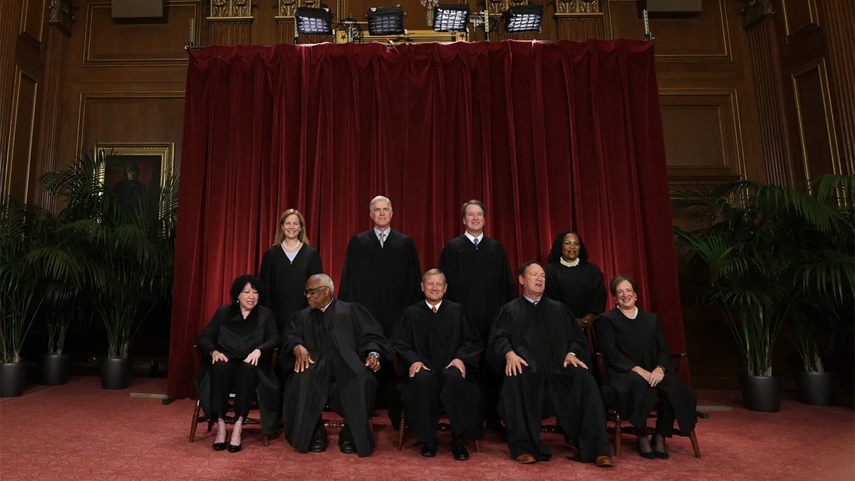 Supreme Court justices posing for official portrait in East Conference Room Washington DC
