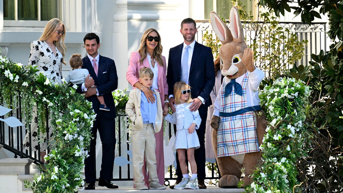 Tiffany Trump and Michael Boulos standing with Lara Trump and Eric Trump on the White House South Lawn