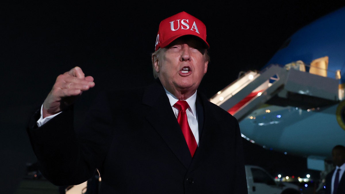 Trump speaking outside Air Force One.