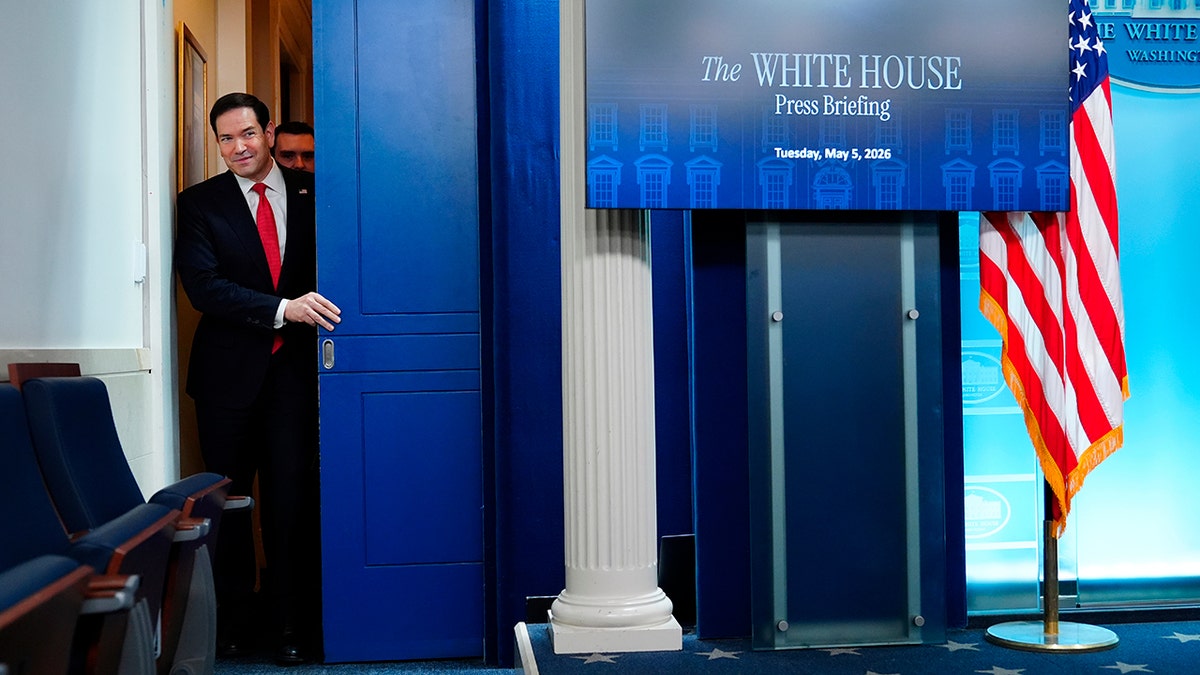 Secretary of State Marco Rubio walking out to speak to reporters at the White House briefing room