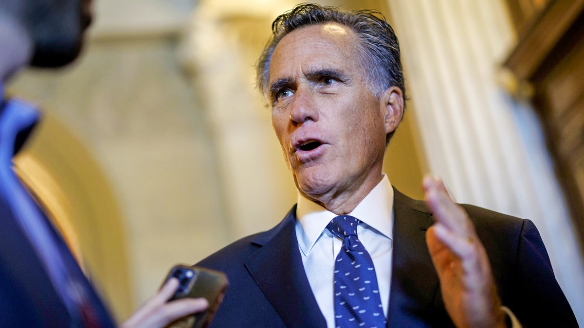 Senator Mitt Romney speaking to press on Capitol Hill in Washington, D.C.