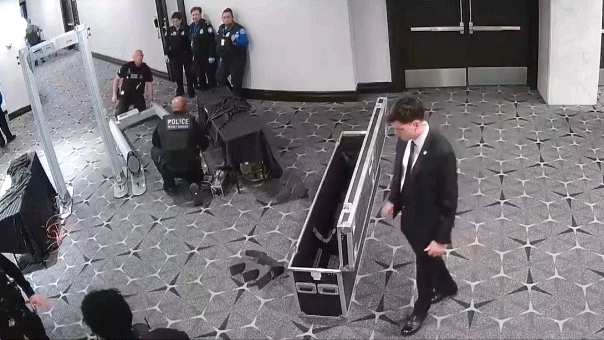 Cole Allen running past Secret Service agents
