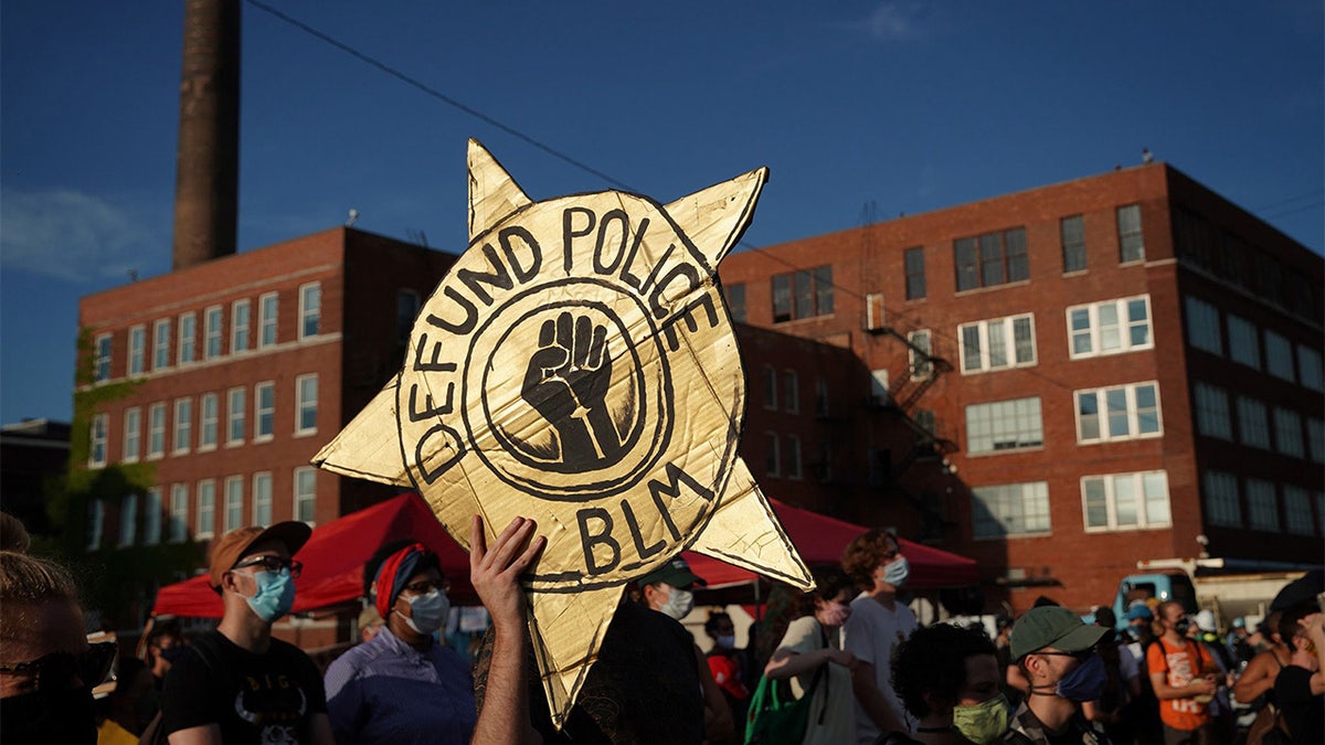A Defund the Police sign displayed outdoors