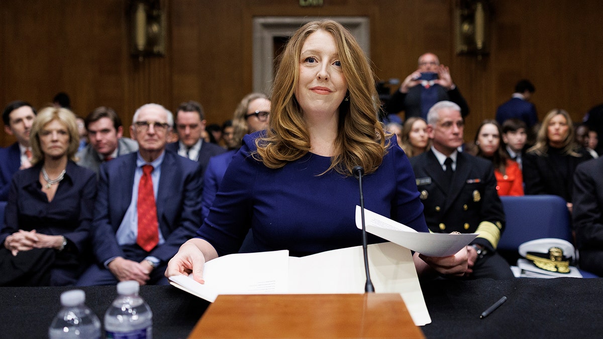 Dr. Casey Means sitting at a witness table in a Senate committee room