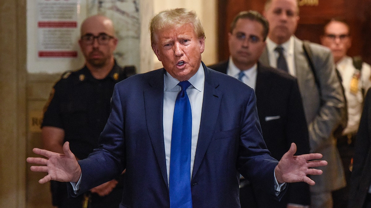 Former President Donald Trump speaking to media outside New York State Supreme Court