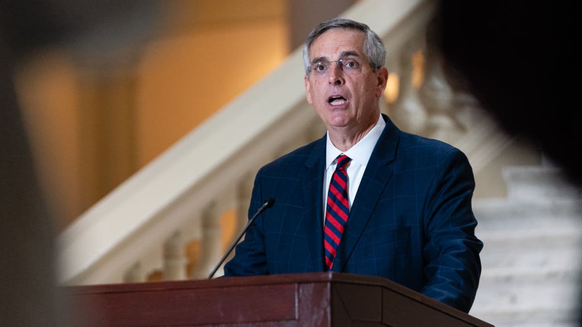 Georgia Secretary of State Brad Raffensperger speaking at a press conference at the Georgia State Capitol