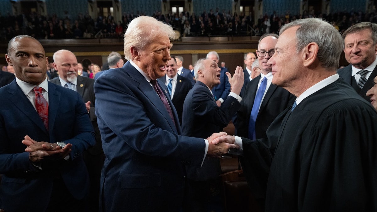 U.S. President Donald Trump greets Chief Justice John G. Roberts Jr. at the U.S. Capitol