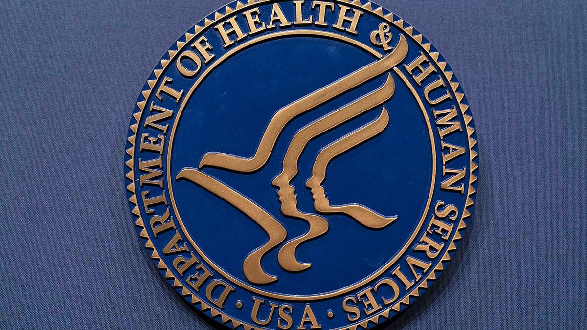 The Health and Human Services seal displayed at the Hubert Humphrey Building Auditorium