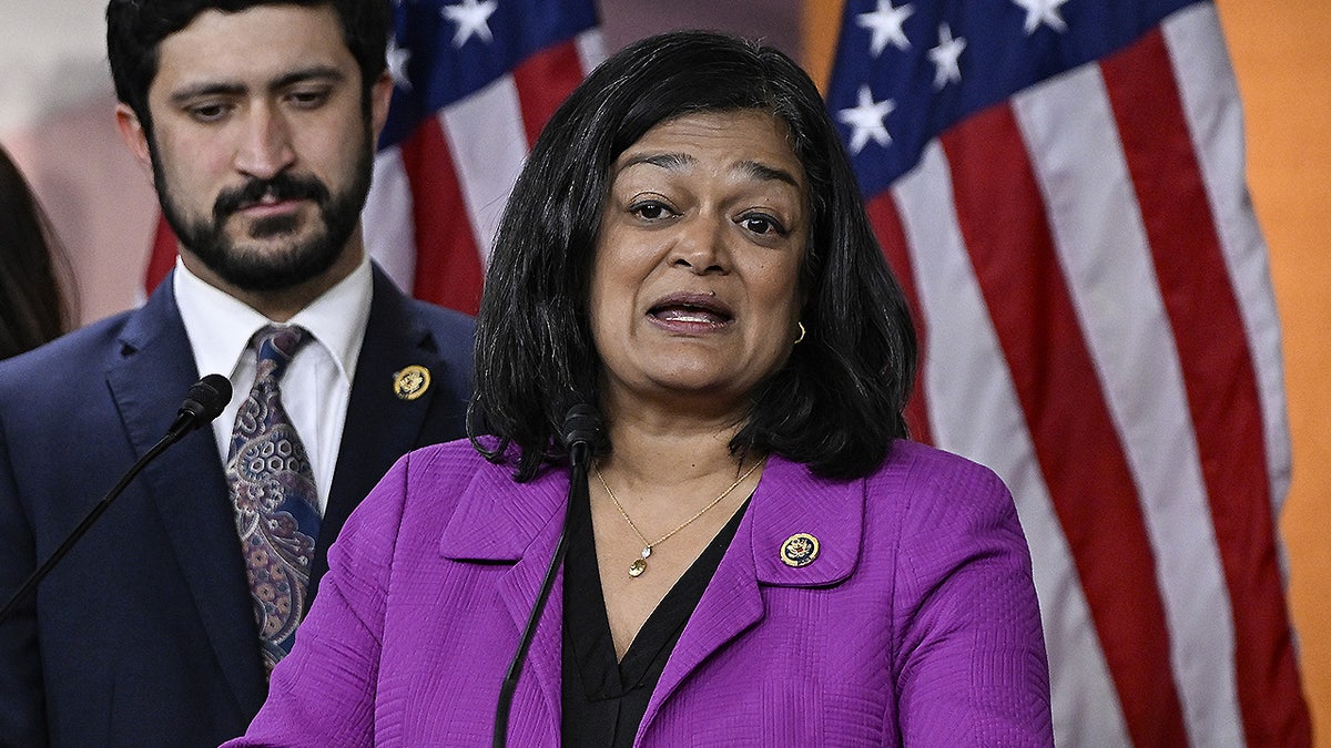 Rep. Pramila Jayapal speaking at a podium