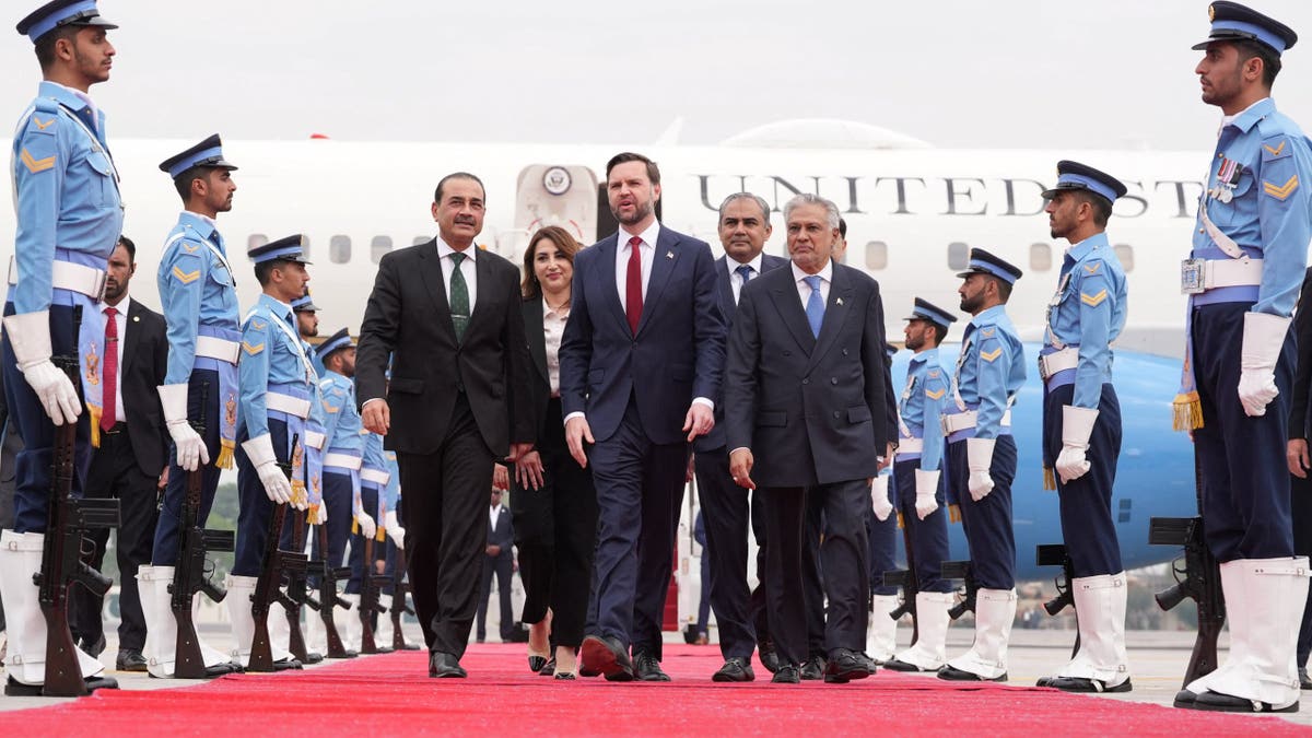 U.S. Vice President JD Vance walking with Pakistani officials in Islamabad
