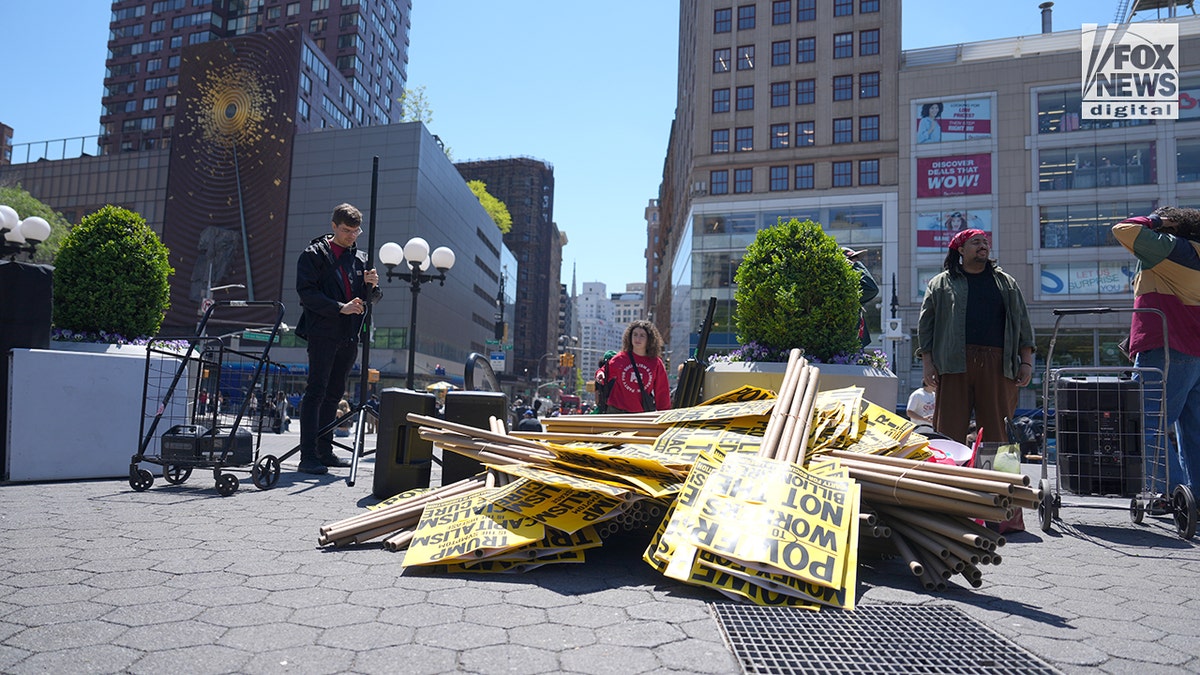 The Party for Socialism and Liberation prepare signs ahead of a May Day march in New York City, NY, Friday, May 1, 2026. (Fox News Digital)