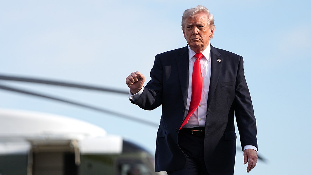 President Donald Trump walking from Marine One to board Air Force One at Ocala International Airport