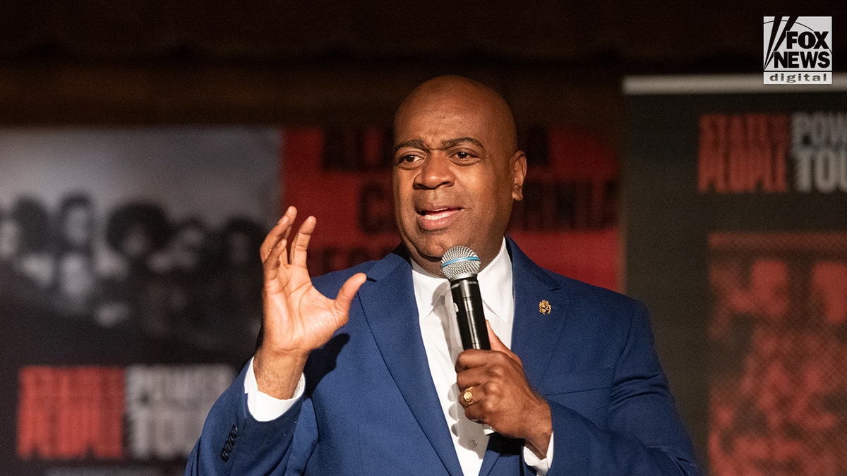 Ras Baraka speaking at a podium during an event in Newark, New Jersey