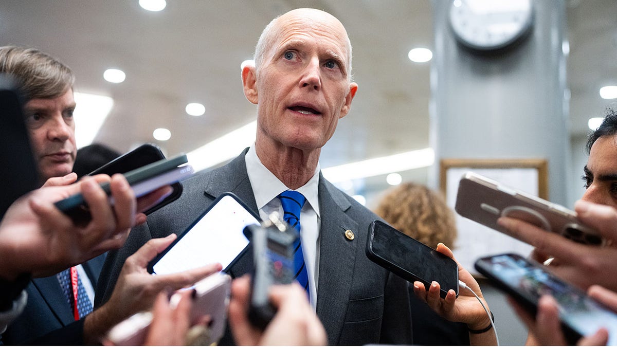 Sen. Rick Scott speaking to reporters outside the U.S. Capitol