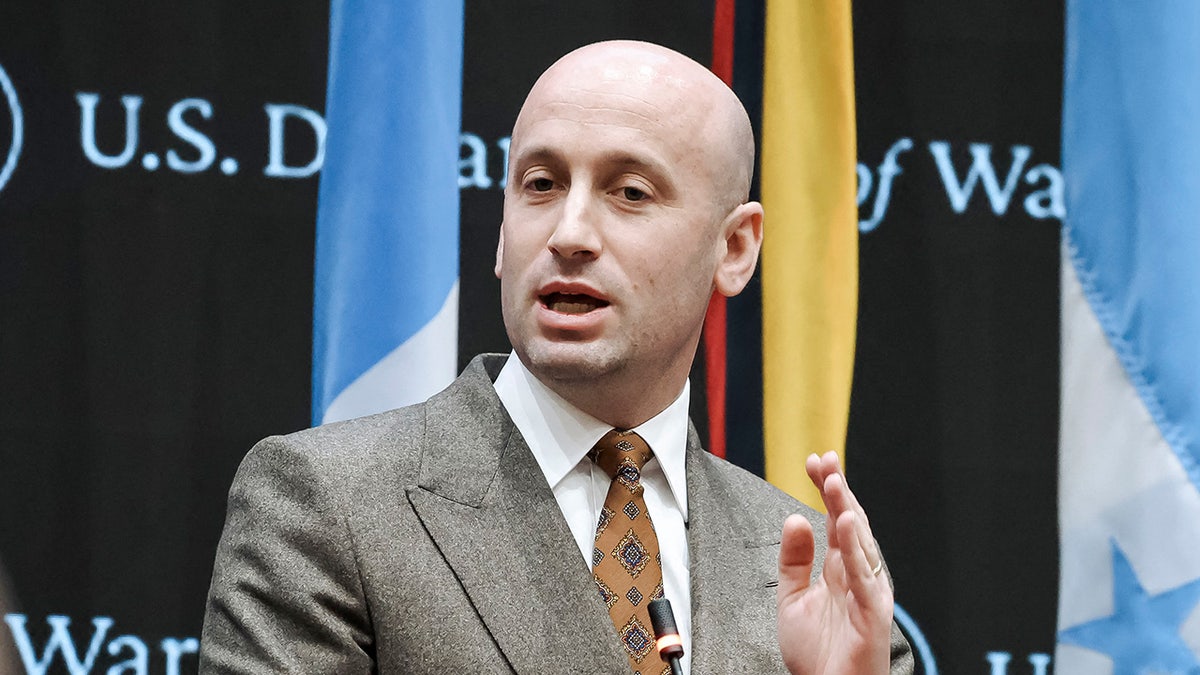 White House Deputy Chief of Staff Stephen Miller speaking at a podium