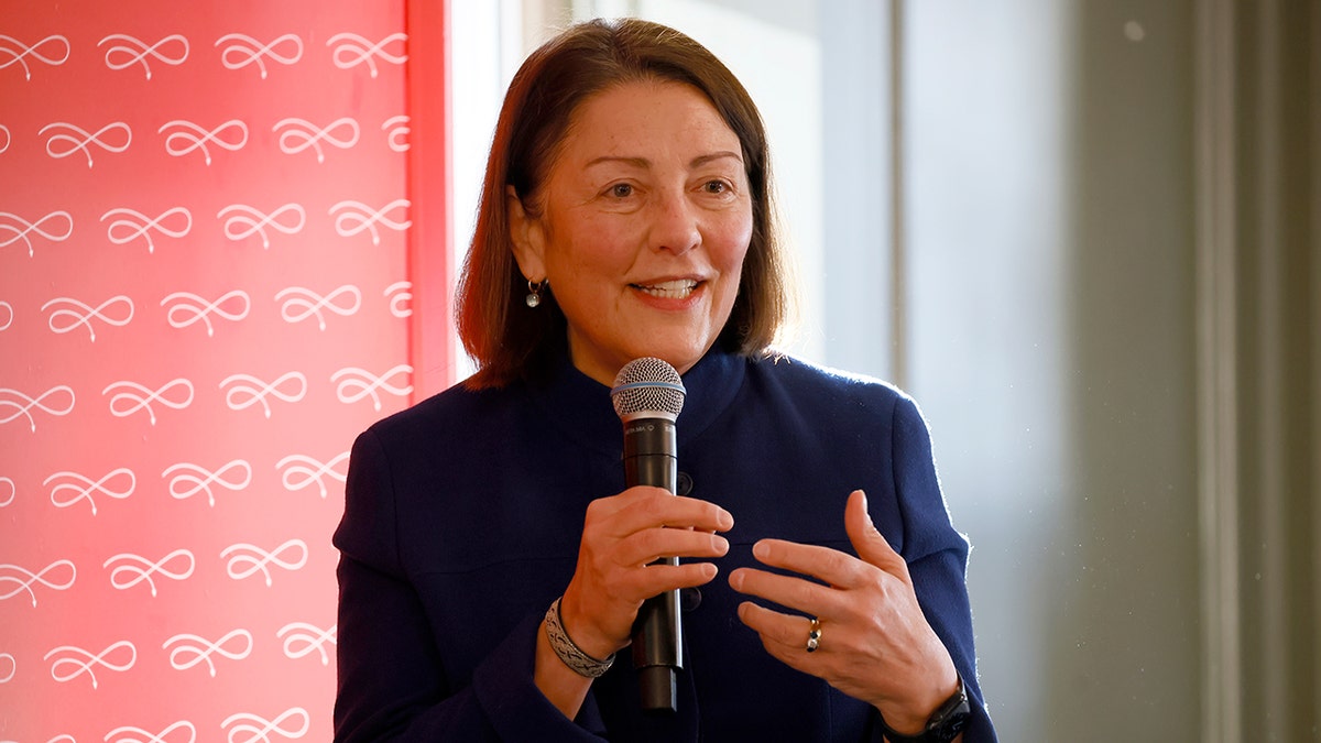 Suzan DelBene speaking onstage at the Puck Power Breakfast in Washington, DC