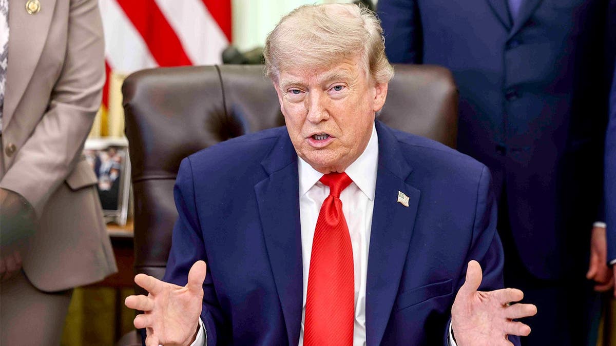 Trump speaks in Oval Office during proclamation signing ceremony.