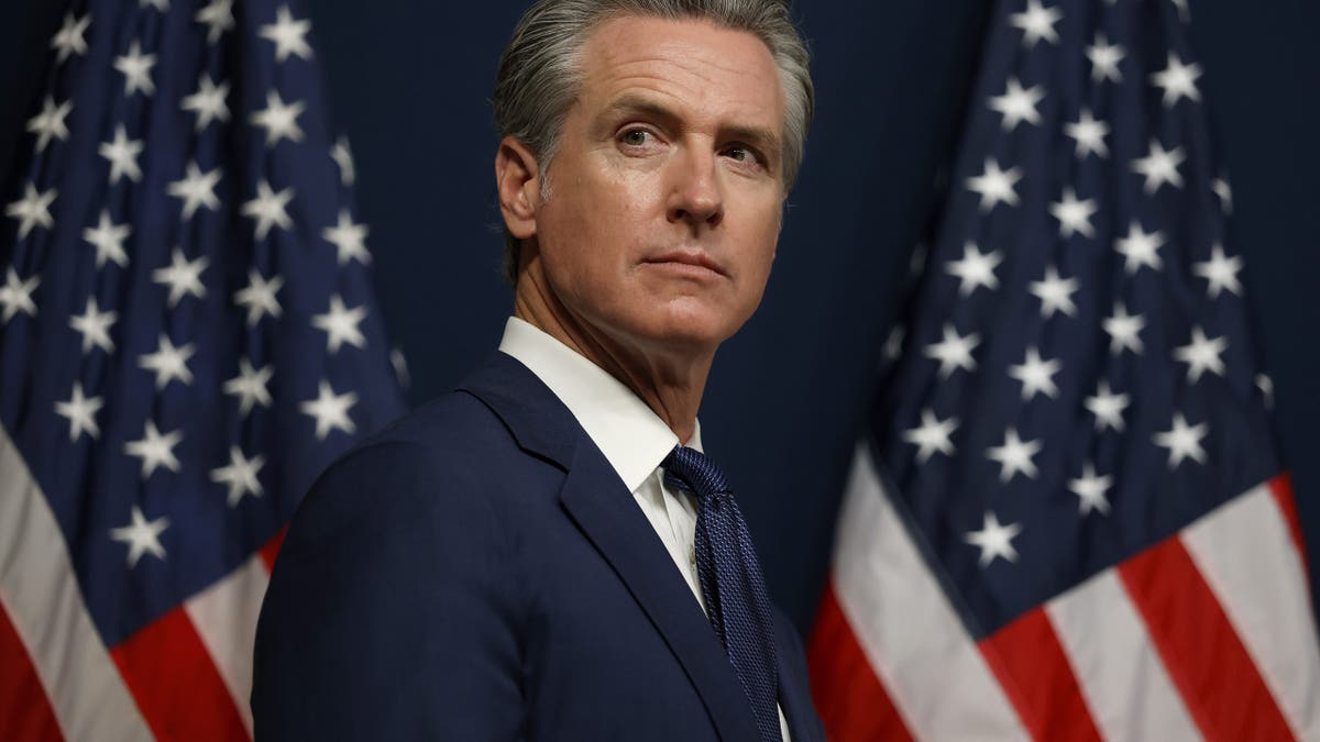 California Gov. Gavin Newsom looking on during a bill signing event in Sacramento
