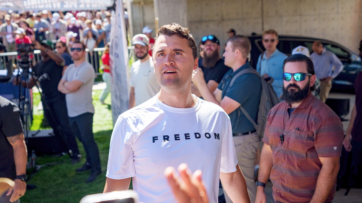 Charlie Kirk speaking at Utah Valley University podium