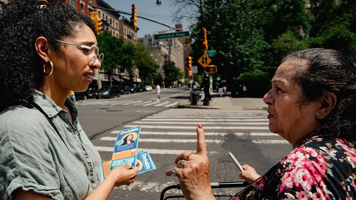 Darializa Avila Chevalier speaking with Maria Rodriguez in Morningside Heights Manhattan