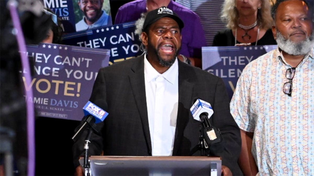 Jamie Davis speaking at a campaign event