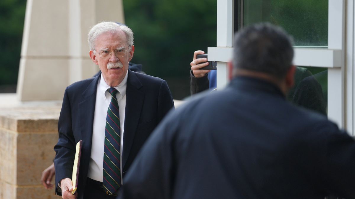 John Bolton arrives at court on June 26, 2026.