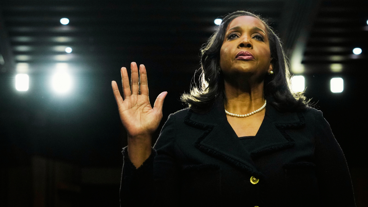 Lisa DeNell Cook taking an oath during a Senate Banking nominations hearing in Washington