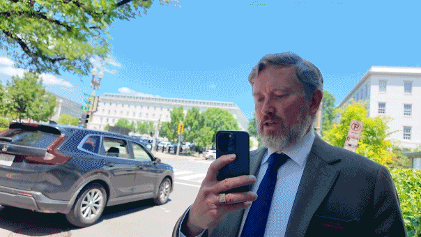 GIF of Massie turning his phone on a Fox News Digital reporter.